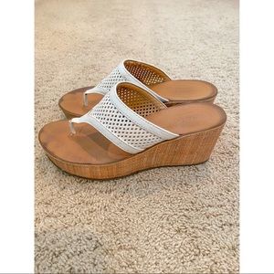 Clark’s Collection white sandals.